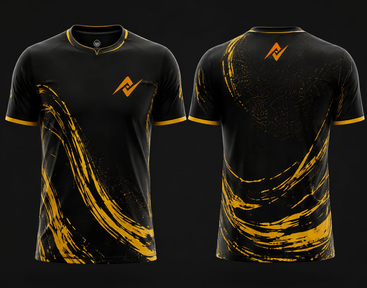 Front and back view of Golden Storm Free Fire esports jersey featuring black and gold brush-stroke graphics, round neck collar, and orange logo placement on chest and upper back neck.