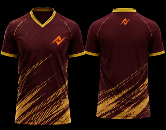Front and back view of a maroon and gold V-neck cricket jersey featuring dynamic gold brushstroke graphics with an orange logo on the chest and upper back.