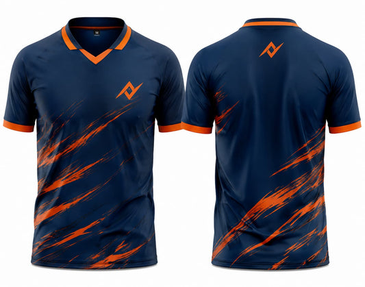 Front and back view of a navy blue V-neck cricket jersey featuring bold orange brushstroke graphics with orange collar, orange sleeve cuffs, chest logo, and logo below the back neckline.