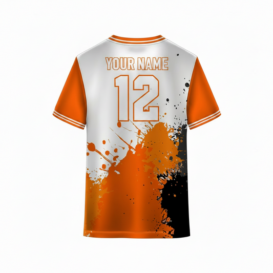 Orange and white custom sports jersey back view with black paint splash grunge pattern design for cricket football volleyball and esports team uniforms by NextPrint