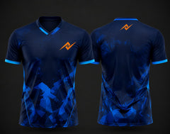 Front and back view of a royal blue custom V-neck cricket jersey featuring geometric blue crystal graphics, custom chest logo, and matching back neck logo.