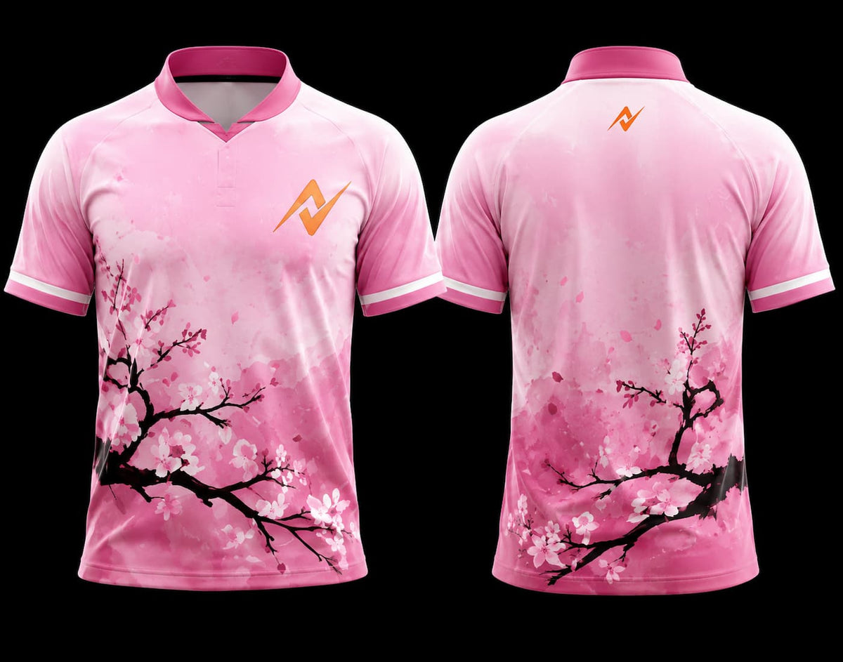 Pink Sakura Blossom esports jersey with Japanese cherry blossom graphics, orange chest logo, and matching orange back neck logo shown from front and back.