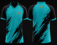 Front and back view of a teal and black brushstroke V-neck cricket jersey with orange logo on the chest and upper back.