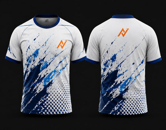 Front and back view of a white and royal blue round neck cricket jersey featuring bold blue paint splash graphics, halftone detailing, and orange chest and back logos.