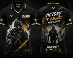 Black and gold tactical esports jersey with military-inspired artwork, V-neck polo collar, and motivational gaming graphics on front and back.