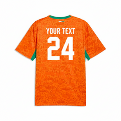 Front view of Côte d’Ivoire 2026 orange home fan jersey with textured pattern and green side accents
