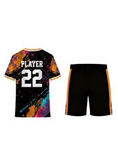 Custom black sports jersey with colorful paint splash abstract design and matching black shorts for cricket, football and esports team uniforms by NextPrint India