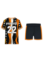 Custom black and orange sports jersey with abstract wave and polka dot pattern and matching shorts for cricket, football and team sports by NextPrint India