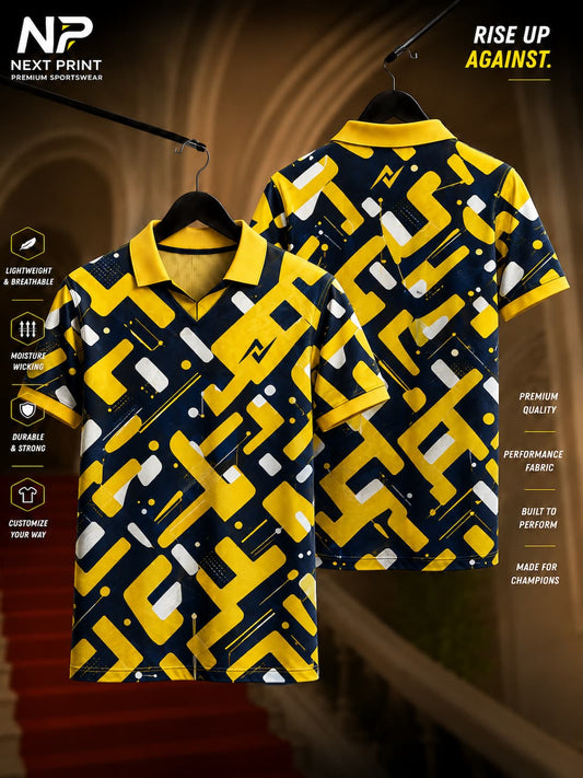 Elite Urban Mosaic yellow and navy polo sports jersey featuring an abstract geometric mosaic pattern with white accents, front and back view.