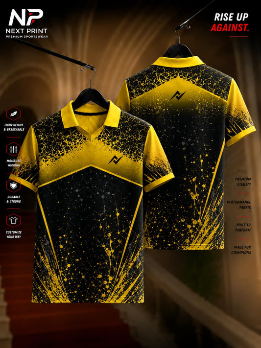 Front and back view of the Elite Yellow Eclipse Performance Polo Jersey featuring a bold black geometric body with yellow shoulder panels, paint-splash detailing, and a premium polo collar.