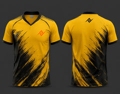 Front and back view of a golden yellow and black V-neck cricket jersey featuring bold brushstroke graphics with an orange chest logo and matching back neck logo.