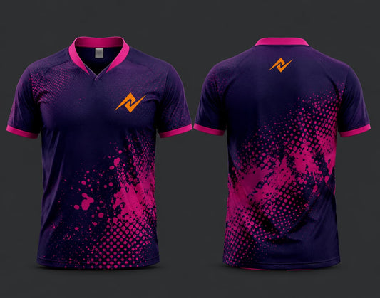 Front and back view of a midnight purple and magenta V-neck cricket jersey featuring paint-splash and halftone graphics with an orange chest logo and back neck logo.