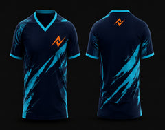 Front and back view of a navy blue and cyan custom V-neck cricket jersey featuring dynamic cyan brushstroke graphics and an orange chest logo.