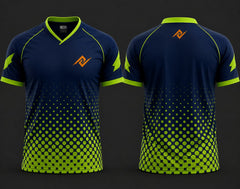 Front and back view of a navy blue and neon green hexagon pattern V-neck cricket jersey featuring an orange logo on the left chest and below the back neckline.
