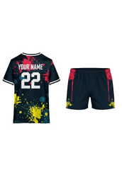 Navy custom sports jersey with colorful paint splatter design in red and yellow with matching shorts, back view for cricket and football team uniforms in India