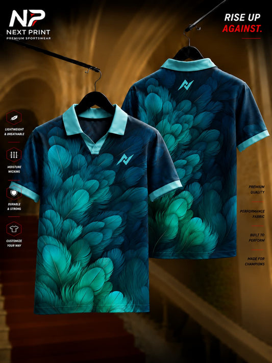 Front and back view of an emerald feather pattern polo collar V-neck cricket jersey in navy and teal by Next Print.